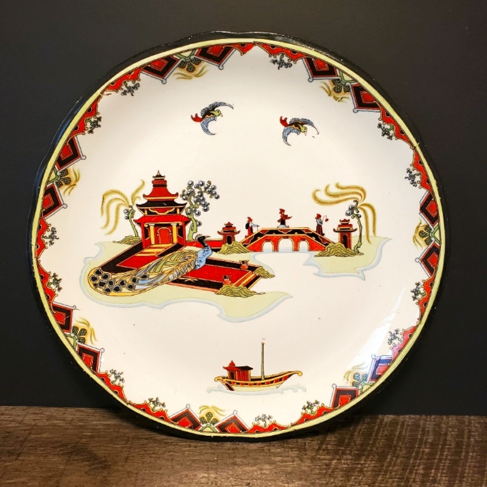 Decorative Asian-Inspired Plate with Red and Gold Accents 10"